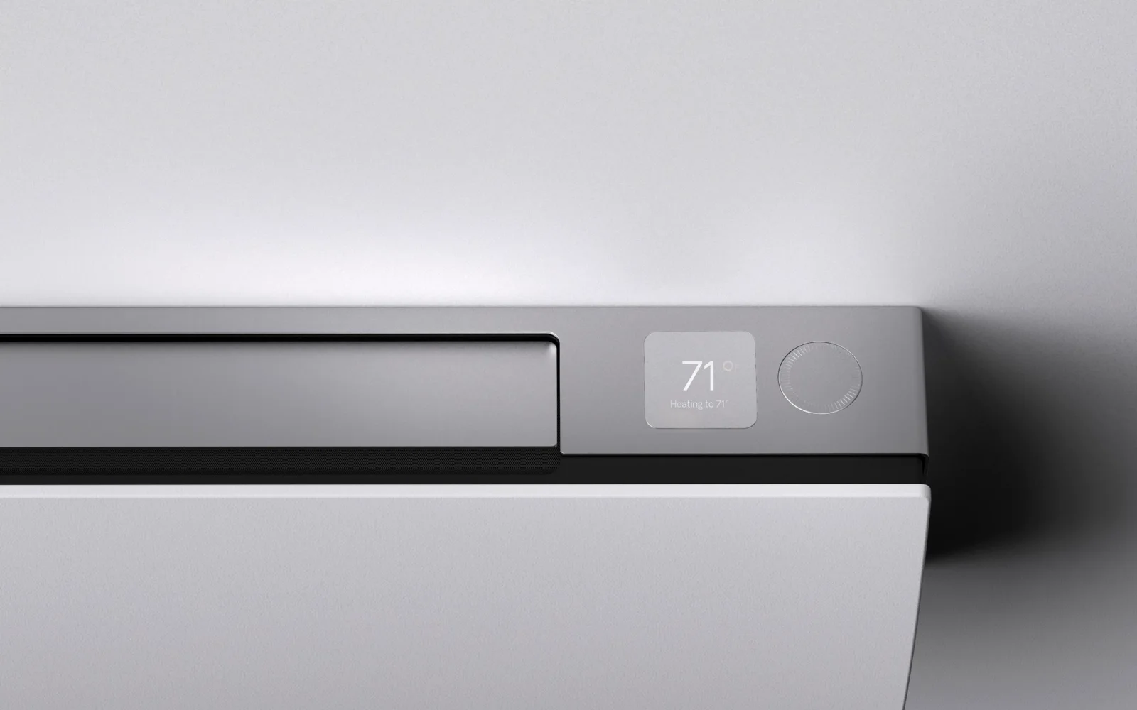 The unit display reading 71 degrees Fahrenheit, heating to 71, beside its control dial